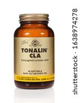 Small photo of Lisbon, Portugal. February 7, 2020: Solgar Tonalin CLA. Conjugated Linoleic Acid from. Weight loss fat burner diet supplement. Bottle of pills or tablets. Cutout, cut out or isolated white background