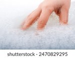 Hand washing and soap foam on a ...