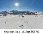 Ski lift in the Alps, ski resort in Alpe d'Huez, sunny weather