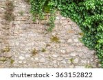Old Stone Wall With Ivy As...