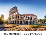 Rome, Italy. The Colosseum or Coliseum at sunrise.