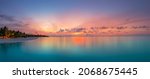 Small photo of Beautiful panoramic sunset tropical paradise beach. Tranquil summer vacation or holiday landscape. Tropical sunset beach seaside palm calm sea panorama exotic nature view inspirational seascape scenic