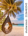 Small photo of Tropical beach sunset as summer landscape with luxury resort beach palm swing hammock, sand seaside shore for sunset beach landscape. Tranquil beach horizon scenery vacation and summer holiday concept