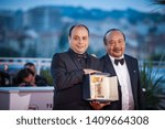 Small photo of CANNES, FRANCE - MAY 25, 2019: Cesar Diaz, winner of the Camera d'Or award for the film "Nuestras Madres" poses with President of the Camera d'or jury Rithy Panh - 72nd annual Cannes Film Festival