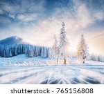 Mysterious landscape majestic mountains in winter. Magical snow covered tree. The lake is frozen on the front. Bokeh light effect, soft filter. Carpathian Ukraine. 