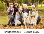 Small photo of Portrait of an extended family on an autumns day