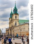 Small photo of WARSAW - MAY 04: Holy Cross Church designed by the architect Joseph Simon Bellotti, built between 1679-1696 in Baroque style in Warsaw in Poland on May 04, 2013