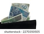Small photo of Polish money. Polish zloty banknotes slid out of the wallet. Such an image can be used as an illustration for many various financial issues. PLN currency.