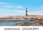 Small photo of Amazing red and white lighthouse near Diaz Point - Luderitz, Namibia