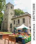 Small photo of London / UK - July 7 2020: St John at Hackney Church next to Hackney street market, Hackney
