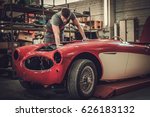 Mechanic Working On Classic Car ...
