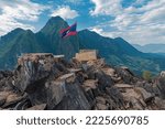 Small photo of Viewpoint on top of mountain in Nong Khiaw, Laos. Translation on wooden sign "Nong Khiaw viewpoint".