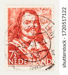 Small photo of SEATTLE WASHINGTON - May 1, 2020: 1943 Stamp of Netherlands featuring Michiel Adriaanszoon de Ruyter, Dutch Admiral of the sea. Scott # 252
