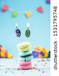 Small photo of Ninetieth 90th Birthday Card with Candle in Colorful Macaroons and Sprinkles. Card Mockup.