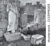 Small photo of Statue without head at the ruins located at Corinth, Greece