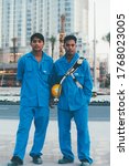 Small photo of JAN 24 -DUBAI, UAE: portraits of foreing workers on the 24 of january 2010 n Dubai,UAE.Dubai has approximately 250,000 laborers, mostly South Asian, working on real estate,often underpaid and in poor