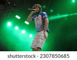 Small photo of Okeechobee, Florida - March 4, 2018 - American rapper and actor David Andrew Burd, also known as Lil Dicky and star of the TV show "Dave" performs at the 2018 Okeechobee Music and Arts Festival.