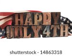 the phrase 'happy July 4th' in ink-stained letterpress type with flags draped behind
