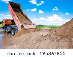 Dumper Truck Unloading Soil Or...