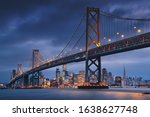 San Francisco downtown with Oakland Bridge in foreground. California famous city SF. Travel destination USA