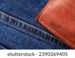 Small photo of Close up of the details of new LEVI'S 501 Jeans. Seams and denim texture close-up. Classic jeans model. LEVI'S is a brand name of Levi Strauss and Co, founded in 1853. 31.12.2021, Rostov, Russia