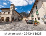 Small photo of VENZONE, ITALY - AUGUST 11, 2022: Ancient town hall and square in Venzone, partially destroyed by the 1976 earthquake and rebuilt between 1979 and 1984. Udine, Friuli-Venezia Giulia, Italy, Europe.