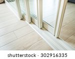 sliding glass door detail and rail embed in wooden floor