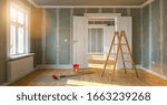 Small photo of Room in renovation in elegant apartment for relocation with paint bucket and Flattened drywall walls