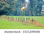 Wide View Of A Yellow Windsock...