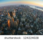Aerial panoramic fish-eye view over lower Manhattan, New York from Empire State building top at sunset