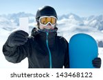 Small photo of Winter Sport girl holding skipass and snowboard smiling. Concept to illustrate ski admission fee