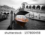Venice taxi boat colorkey New York cab style with view of city in background, Italy, Europe