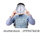Time and daily life concept, Happy Asian little girl hand holding a big clock hide her face in the white background, Copy space, save the Clipping path.