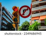 Traffic light and road sign do not turn right in European city