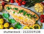 One sheet pan roast trout fillet with potatoes, asparagus and vegetables