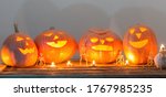 halloween pumpkins with candles ... | Shutterstock . vector #1767985235