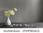 Yellow Roses In White Vase On...