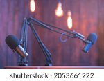 Podcast studio with soundproofing for youtube channels starting to make podcasts for most popular videos. Podcast media studio for broadcasting audio. Podcasting microphone speech or interview.