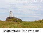 lighthouse on llanddwyn island... | Shutterstock . vector #2145945485
