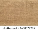 old brown grainy cotton cloth texture background 