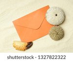 An Orange Blank Envelope On...