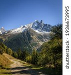 Small photo of View of Aiguille du Dru (the Dru) from a hiking trail near Chamonix in French Alps