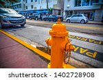Yellow Hydrant On The Edge Of...