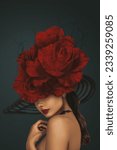 Small photo of beautiful young woman adorned with a big hat beautifully decorated with big red roses. An epitome of floral elegance and grace.