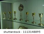 Small photo of MDINA, MALTA - APR 19, 2018 - Bejeweled chalice,pyx and monstrance in thee Treasury of St Paul's Cathedral, Mdina, Malta