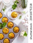Small photo of Homemade zucchini muffins with feta cheese, savory courgette with ingredients