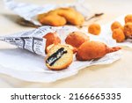 Finger food and street food - fried curd balls filled with Oreo cookies