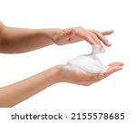 Female hand with soap bubbles on white background. Hands with white bubbles. Texture of white soap foam on female hand.