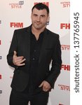 Small photo of Joe Calzaghe arriving for the FHM 100 Sexiest Women in the World 2013 party at the Sanderson Hotel, London. 01/05/2013