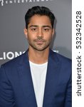 Small photo of BEVERLY HILLS, CA. October 13, 2016: Manish Dayal at the Los Angeles premiere of "American Pastoral" at The Academy's Samuel Goldwyn Theatre.